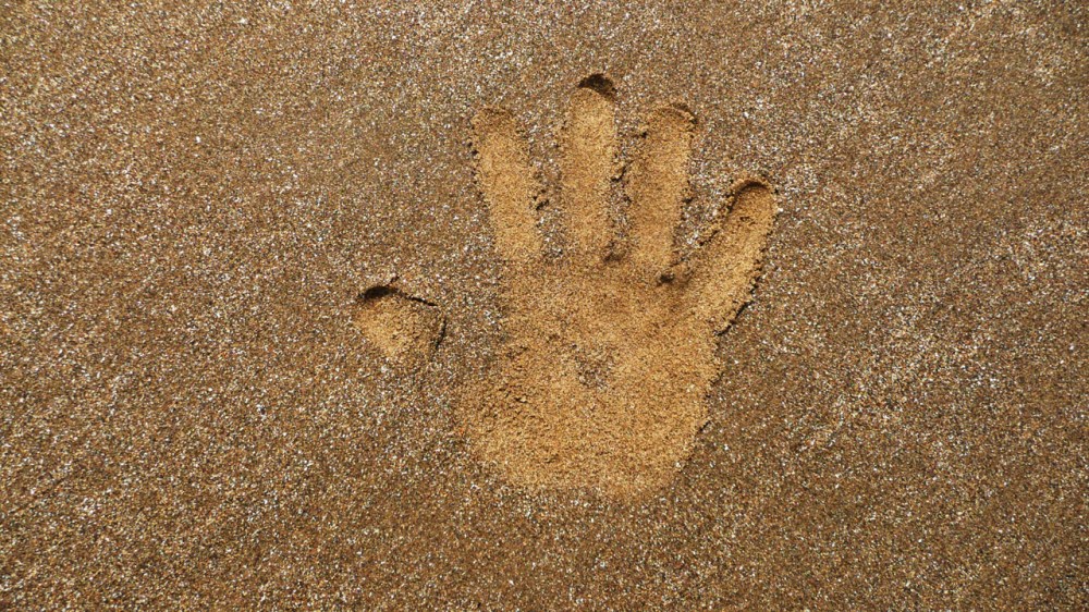 decal-hand-in-the-sand